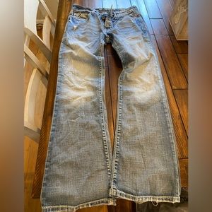 Men’s buckle jeans